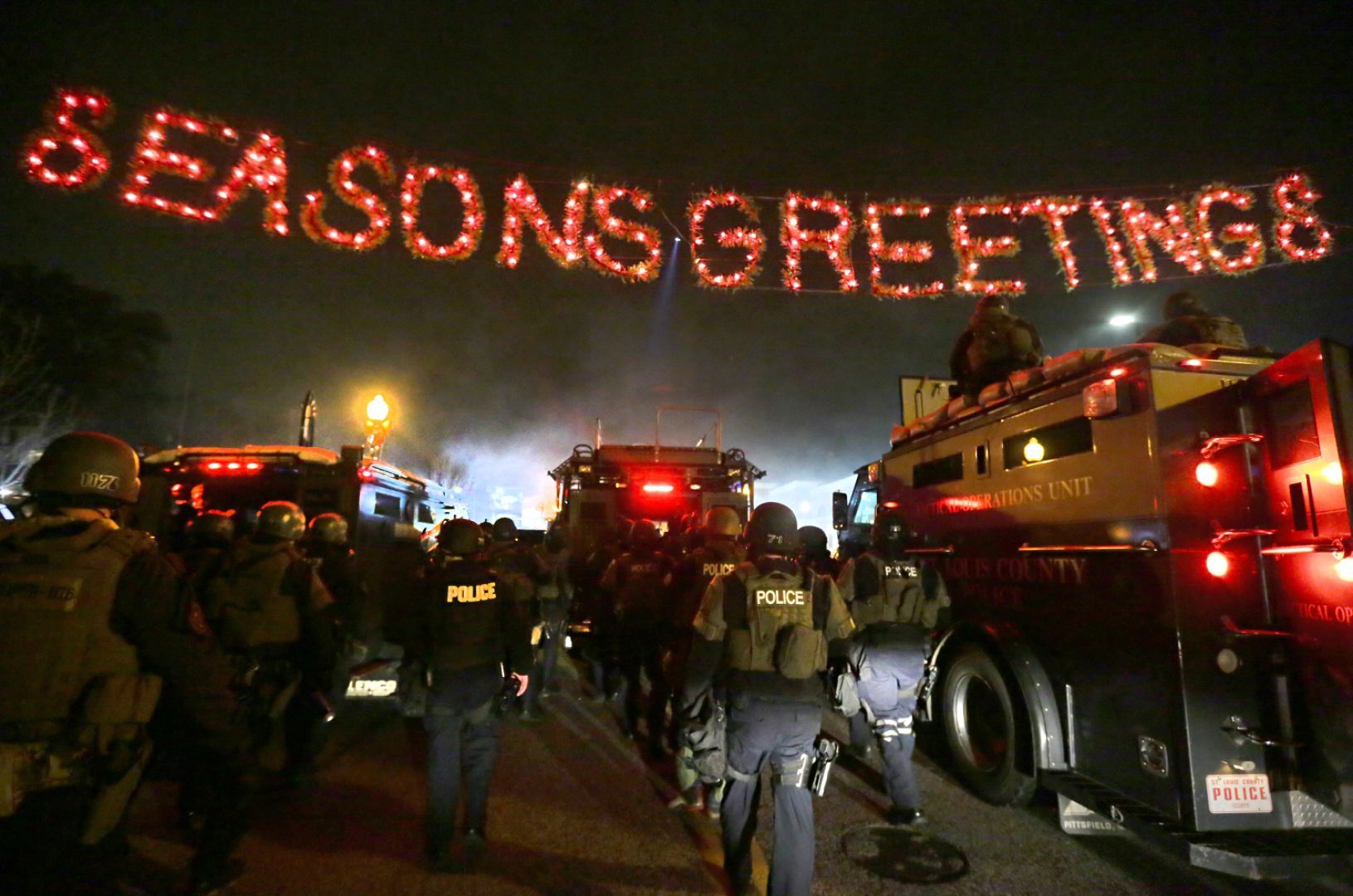 St. Louis County Police respond to crowds after grand jury announcement